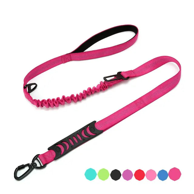 Multifunctional dog leash with: comfortable handle, elastic for shock absorption, seat belt clip and secure attachment clip